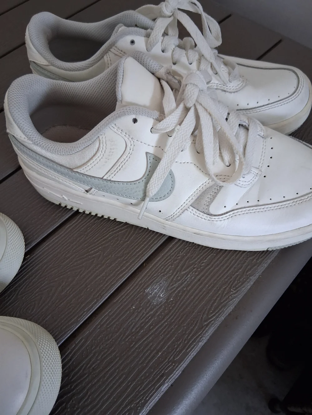 Nike White Low-Top Sneakers with Light Gray Swoosh